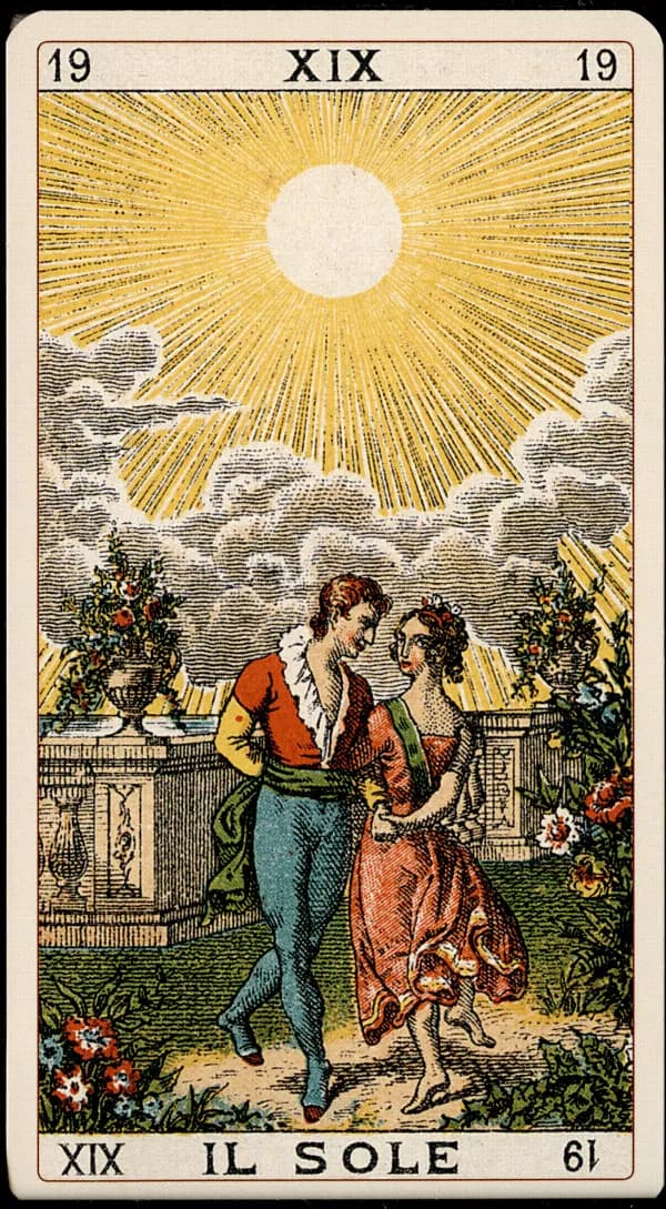 The Sun card from the Tarocchino Milanese deck showing limited woodblock color palette