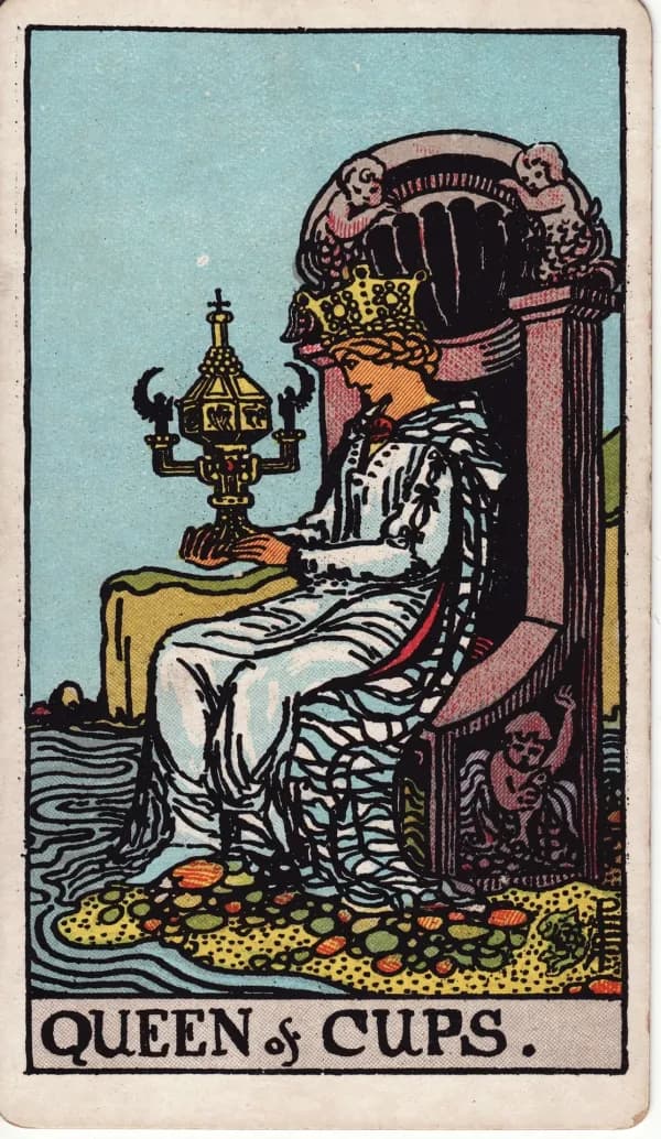 Queen of Cups from the Rider-Waite-Smith deck in cool blue tones